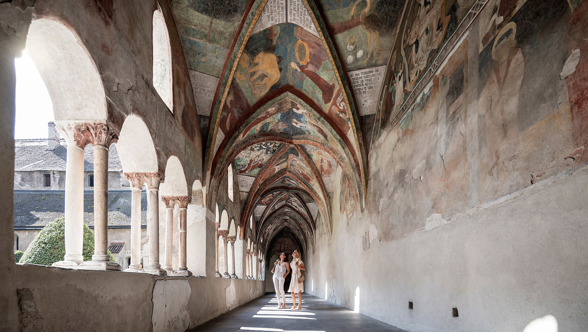 Passage in church with frescoes